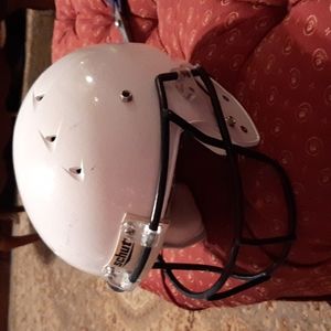Schutt football helmet. Medium. White. Includes padding and facemask.